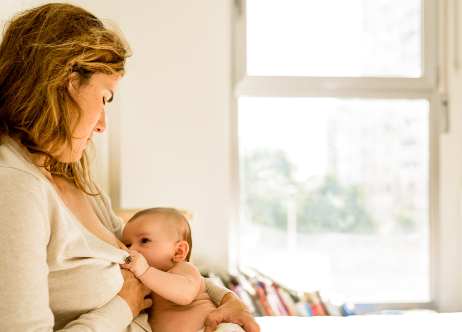 mother breastfeeding her baby