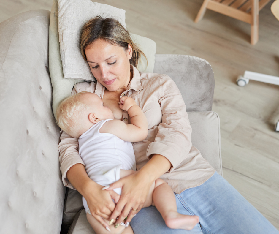 Mother breastfeeding in the laid back position. Nipple pain when breastfeeding - Arlie Hastings Lactation Consultant - breastfeeding support with home visits in the Gold Coast, Tamborine, Logan and Redlands areas.