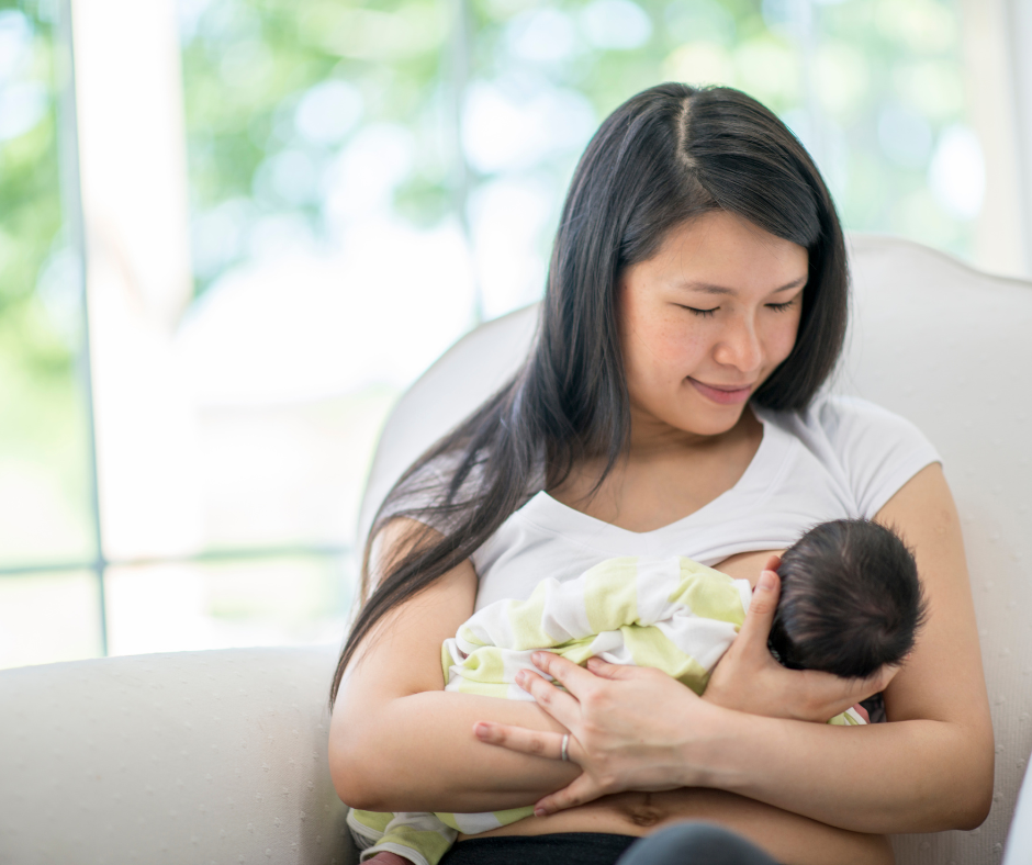 Mother breastfeeding a newborn baby. Arlie Hastings Lactation Consultant - breastfeeding support with home visits in the Gold Coast, Tamborine, Logan and Redlands areas.