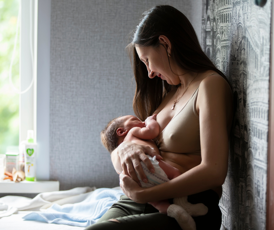 Mother breastfeeding newborn baby- Arlie Hastings Lactation Consultant. Breastfeeding support home visits in Gold Coast, Tamborine, Logan and Redlands. Telehealth video chat consultations.