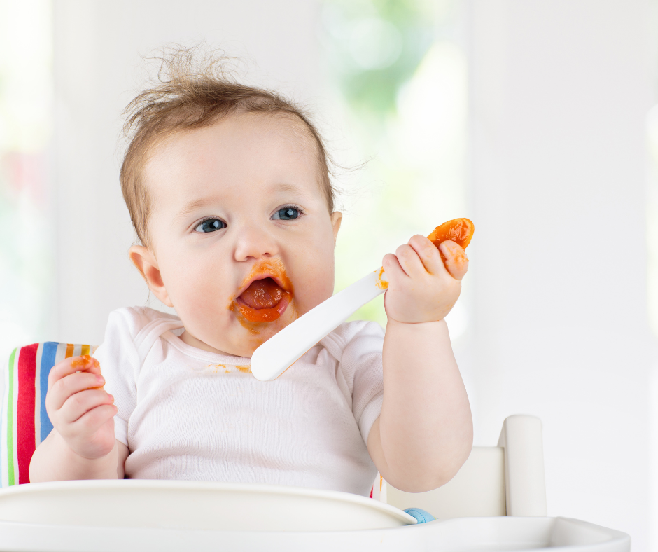 introducing solids while breastfeeding - mother breastfeeding her baby while looking frustrated - Arlie Hastings Lactation Consultant. Breastfeeding support home visits in Gold Coast, Tamborine, Logan and Redlands. Telehealth video chat consultations.